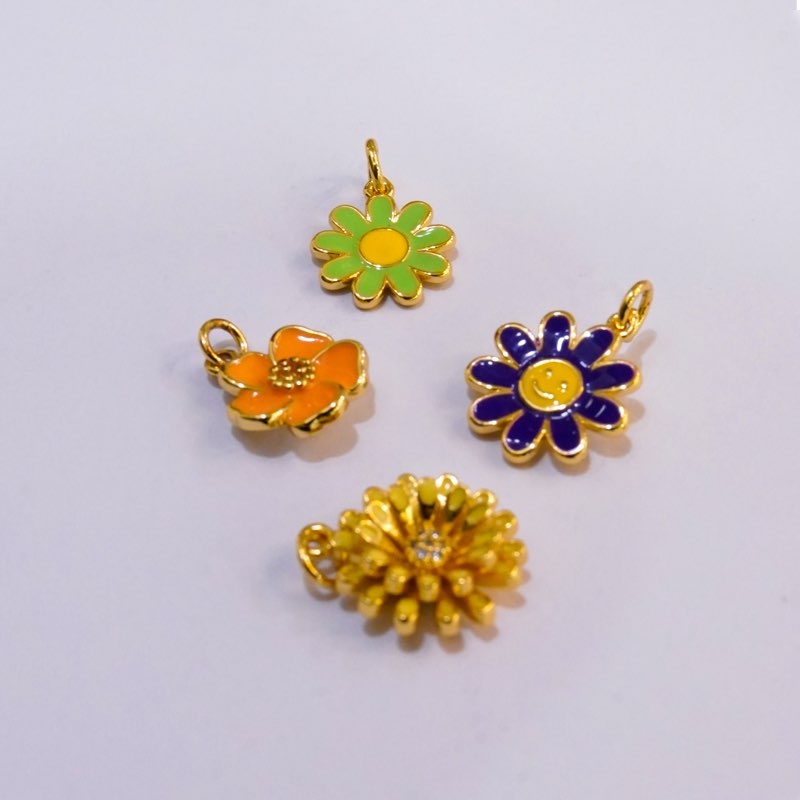 GOLD FLORAL CHARMS image 0