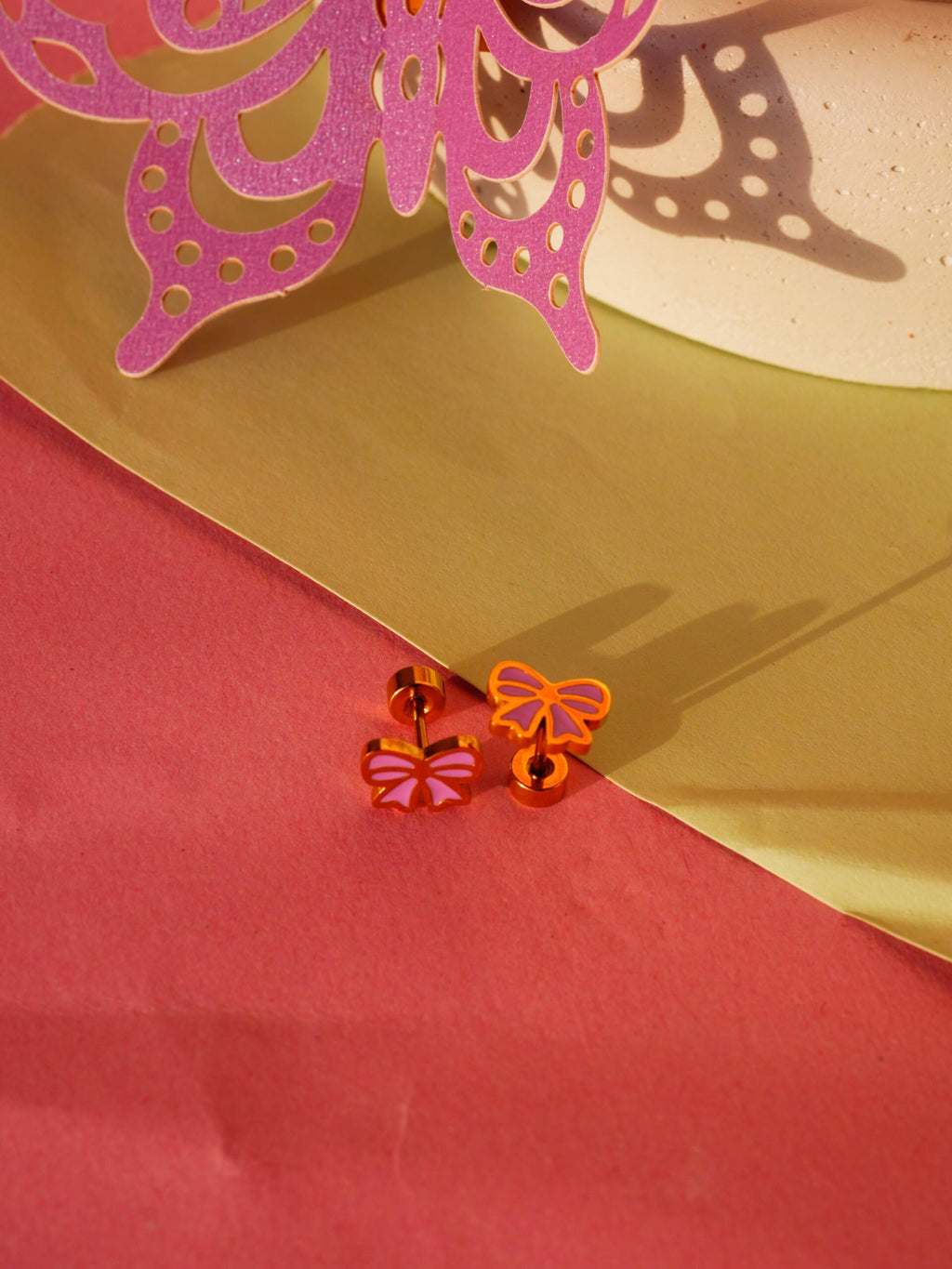 BOW AND BOTS EARRINGS image 0
